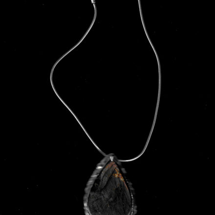 [OGU-TI-008 · Spectrolite · Amulet]